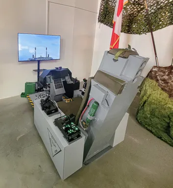 The simulator cockpit with TV in front